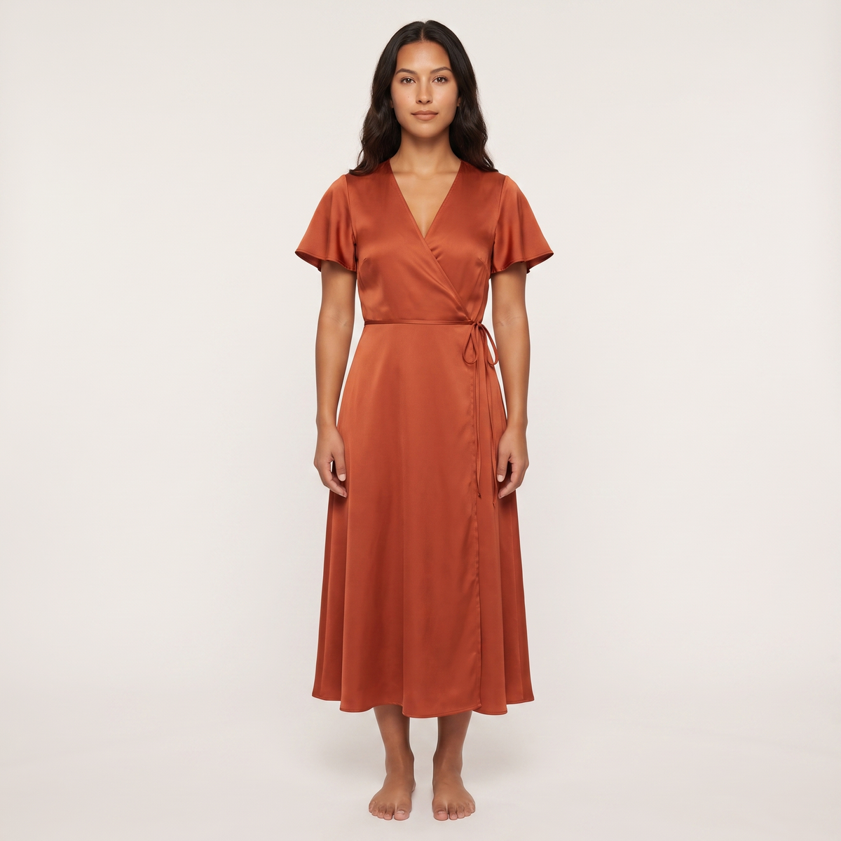 Rust satin wrap midi dress front view on model