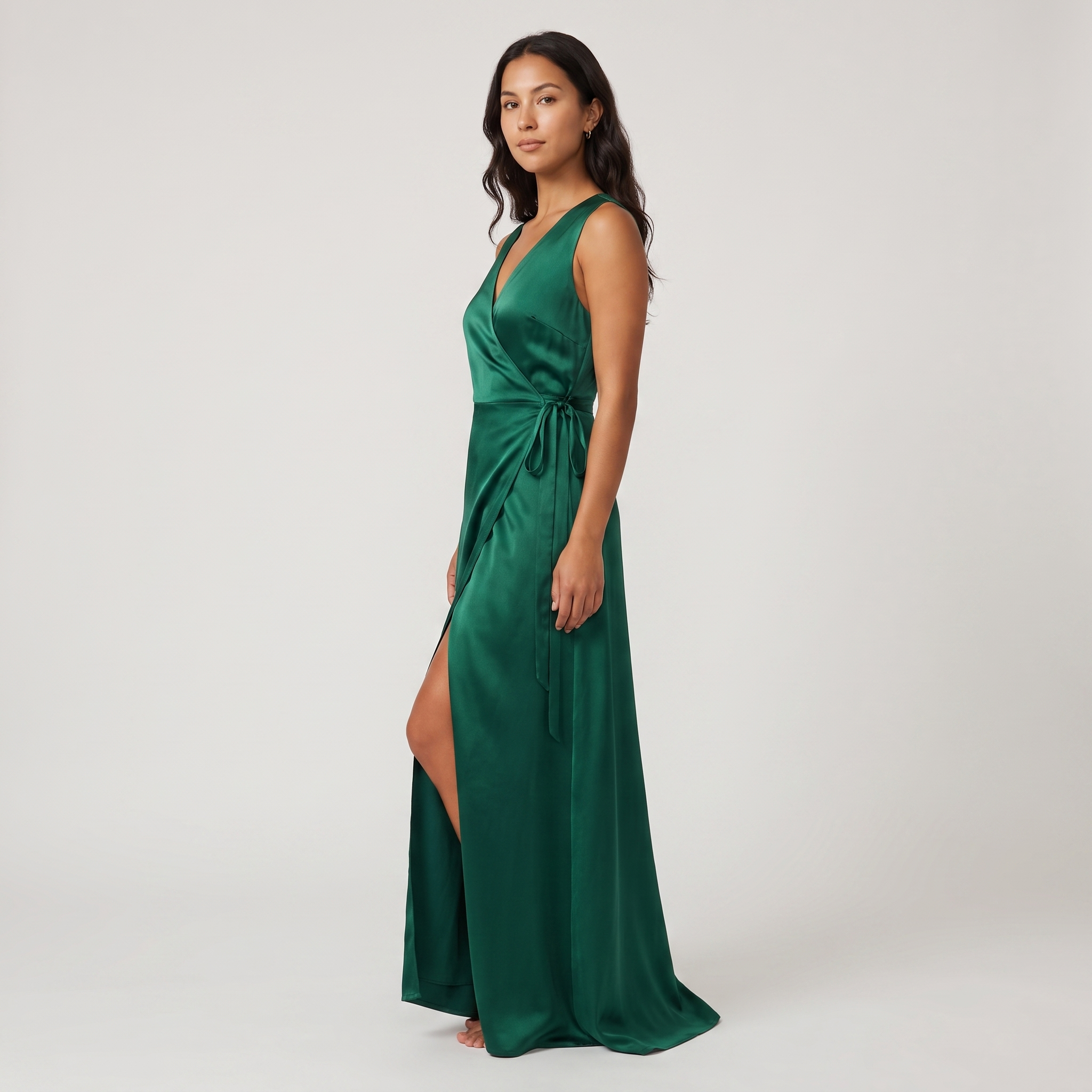 Emerald satin wrap gown side three-quarter view with slit