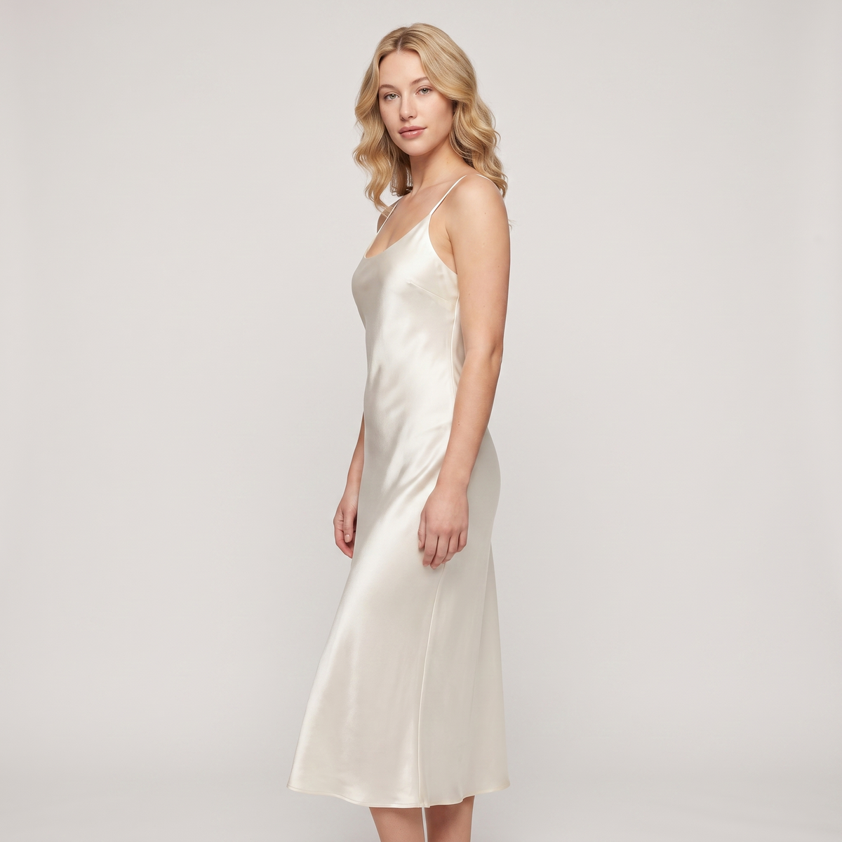 Ivory satin slip midi dress side three-quarter view