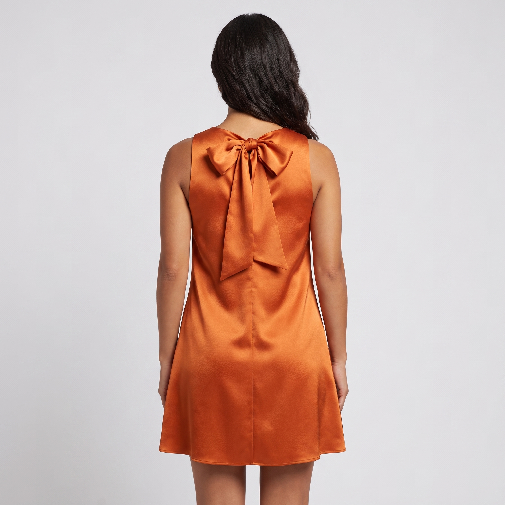 Orange satin bow-back mini dress back view