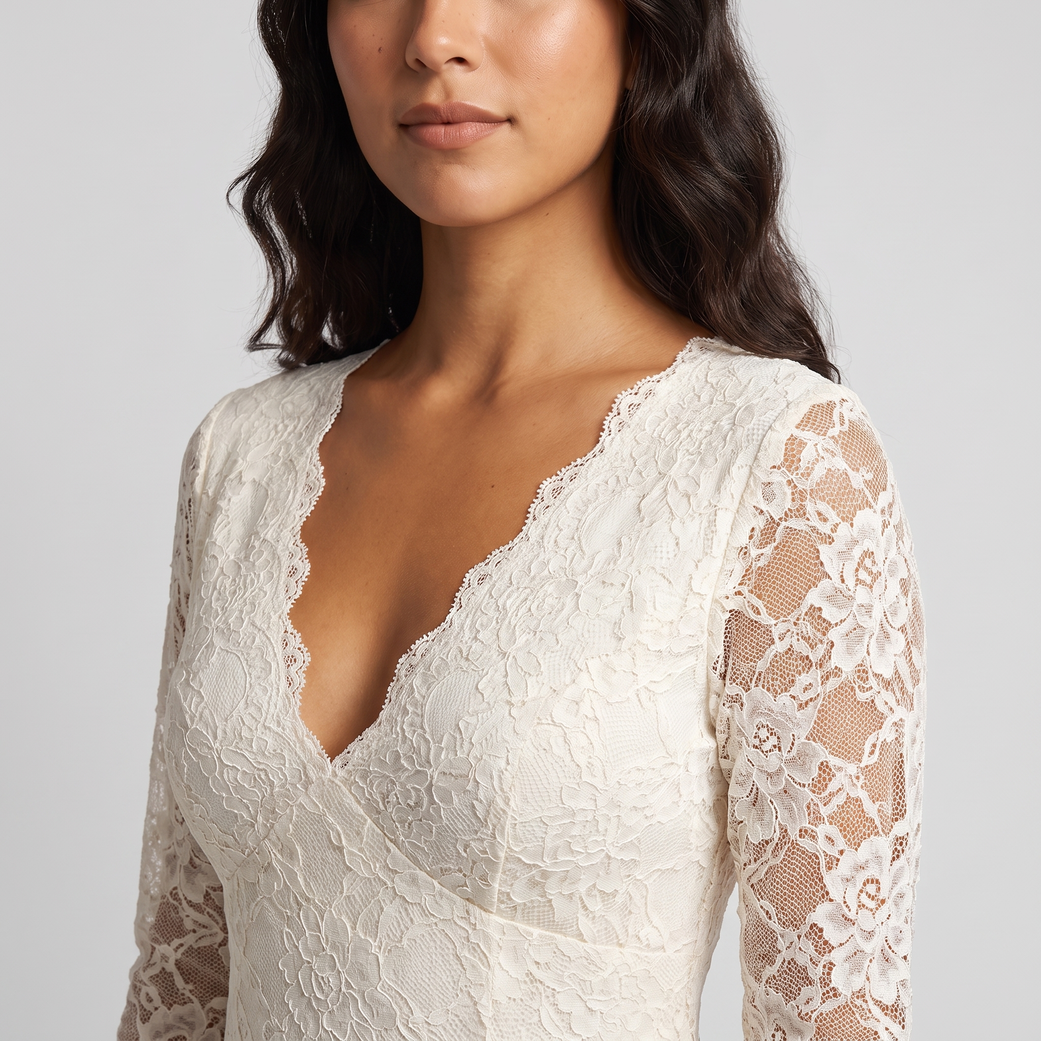 Ivory lace V-neck detail close-up
